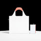 whb-superb LOQI Einkaufstasche in reflektierendem Neon-Orange aus wasserabweisendem, recyceltem Taffeta, faltbar.